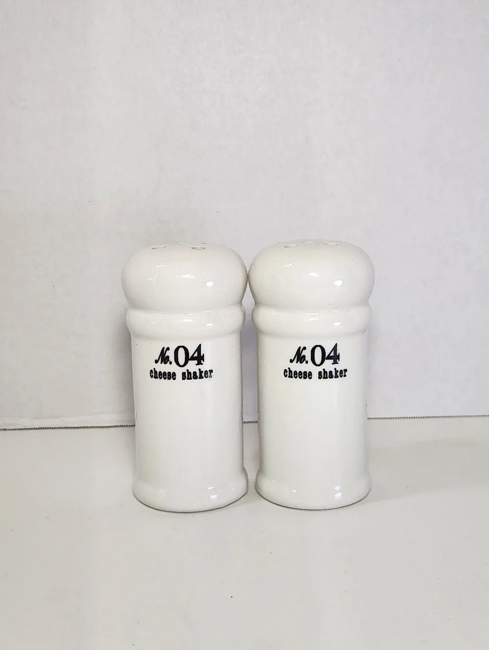 White Ceramic No. 04 Cheese Shakers Set of 2, Perforated Tops With Stoppers